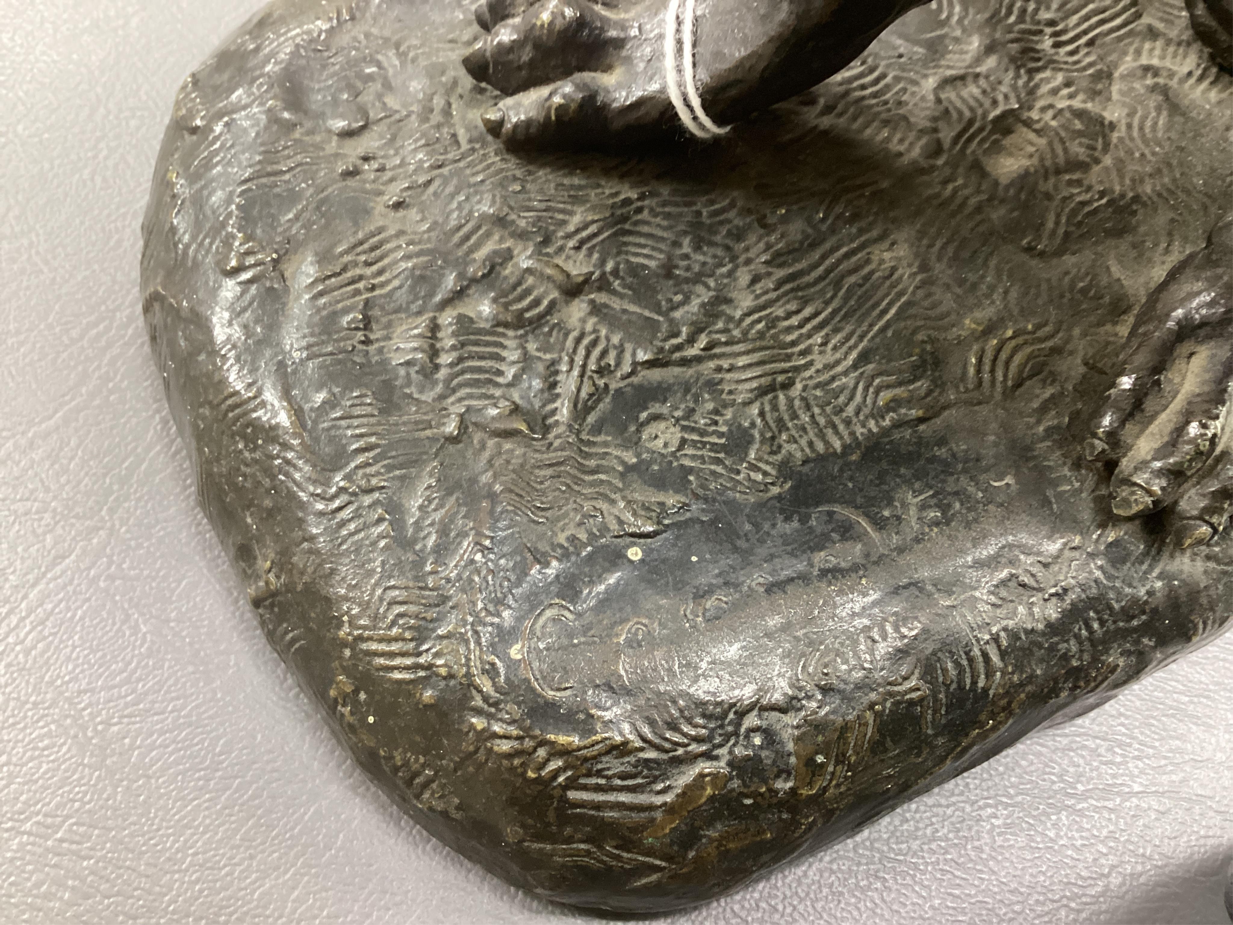 Animalier School, a bronze figure of a seated dog, early 20th century